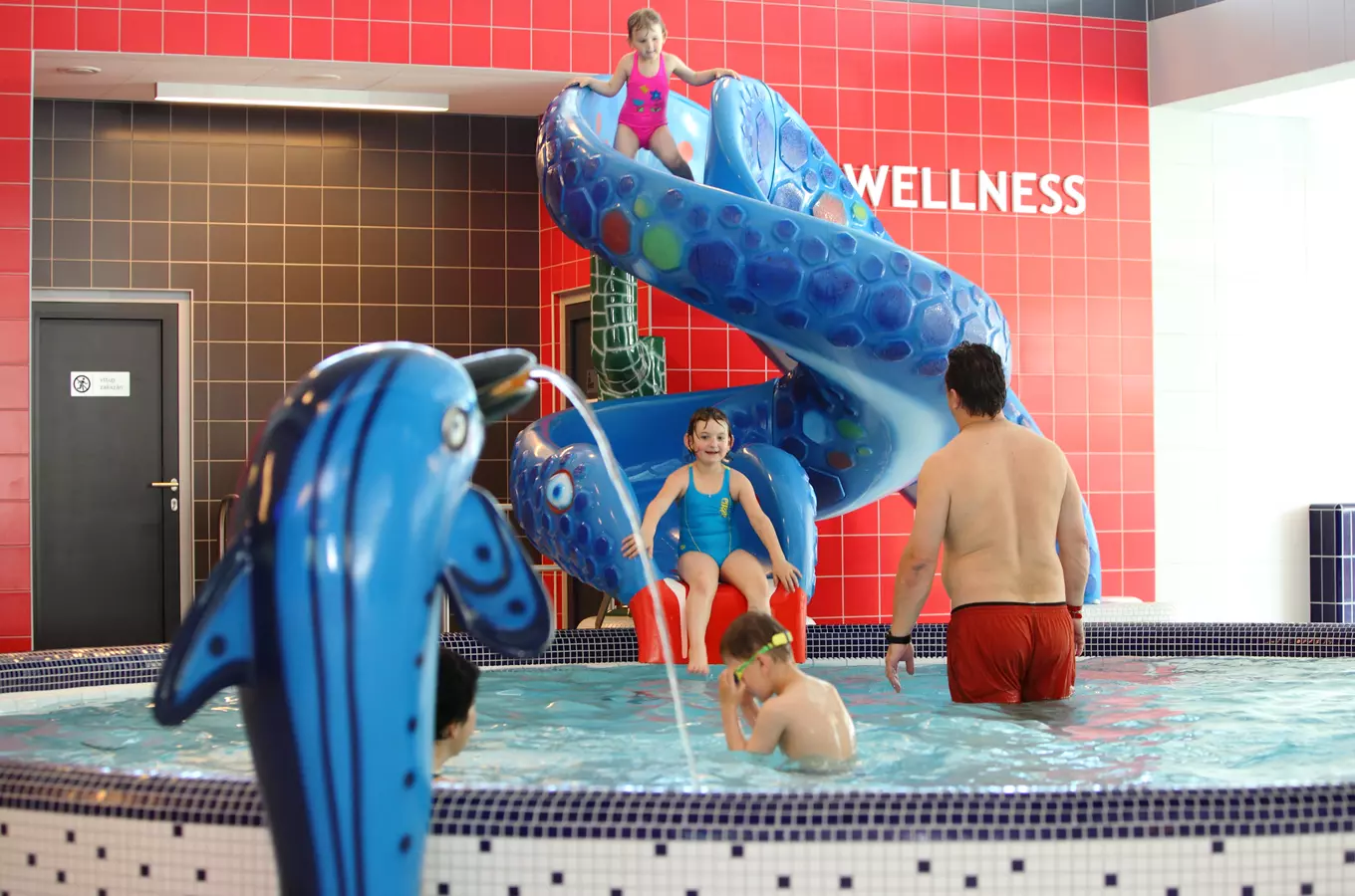 Indoor pool slide with kids