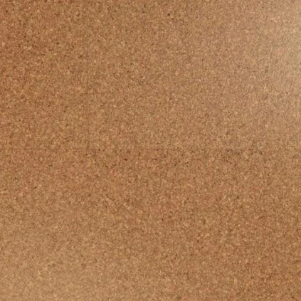 Detailní záběr na texturu korkové podlahy s přirozenou strukturou.