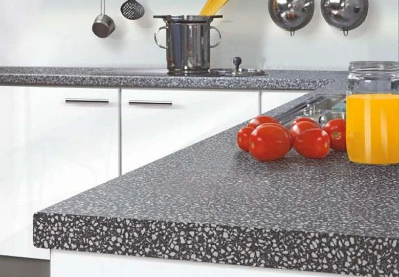 Kitchen countertop with tomatoes and juice