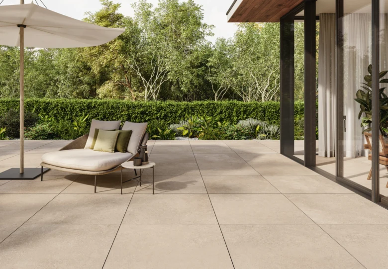 Outdoor terrace tiles with lounge chair and umbrella