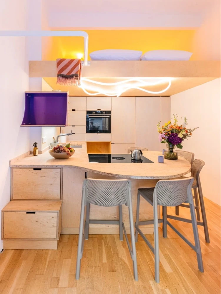 Compact kitchen with loft bed